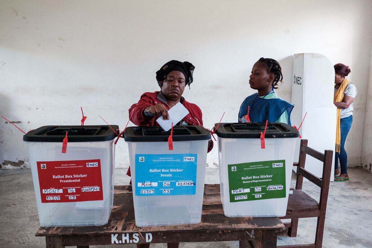 Liberians cast ballots in closely contested presidential runoff election