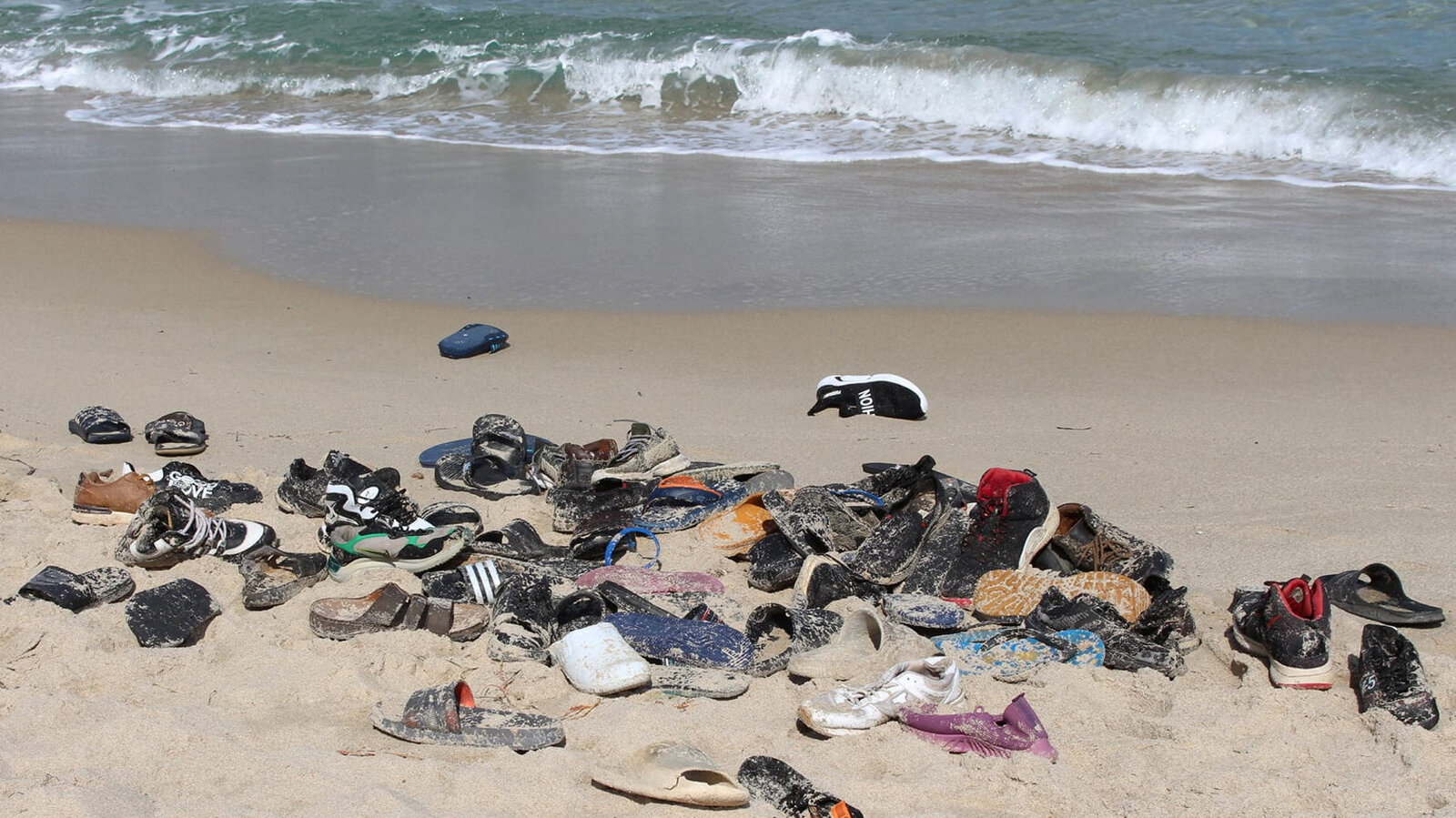 Armed men seize migrant vessel off Libya, aid group sounds alarm