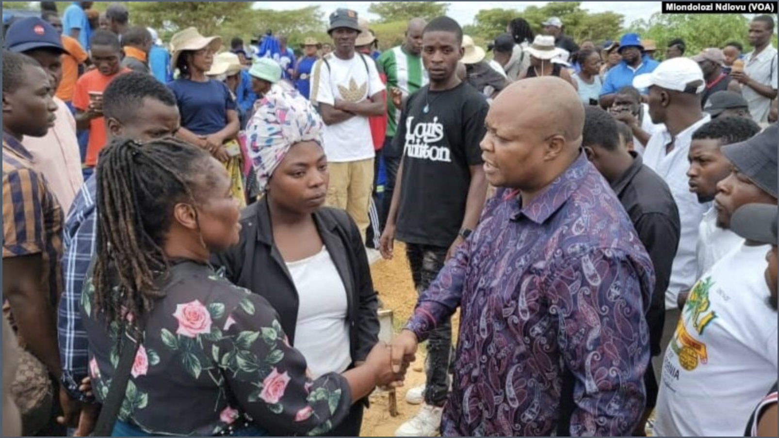 Police charge 18 in Zimbabwe; government warns of crackdown