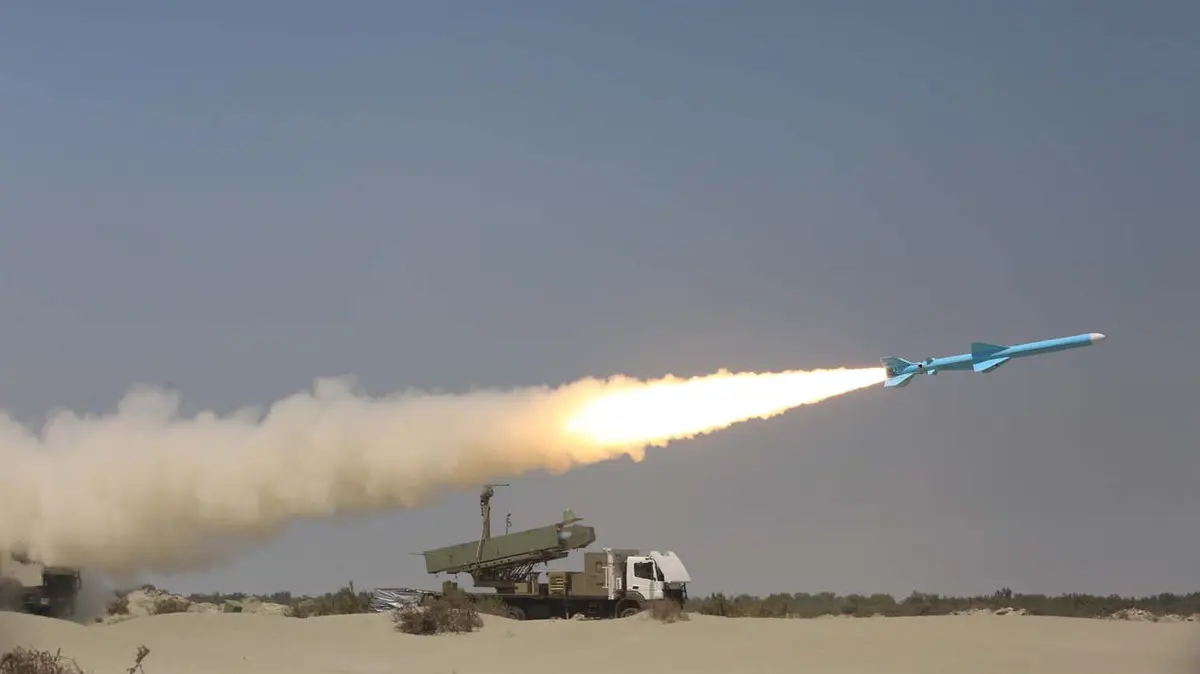 Iran warns US after debuting solid-fueled ballistic missile