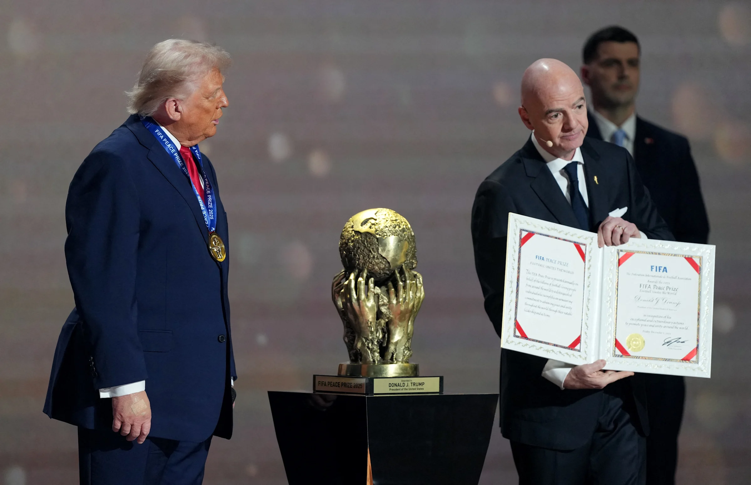FIFA awards Trump its first peace prize during World Cup draw event