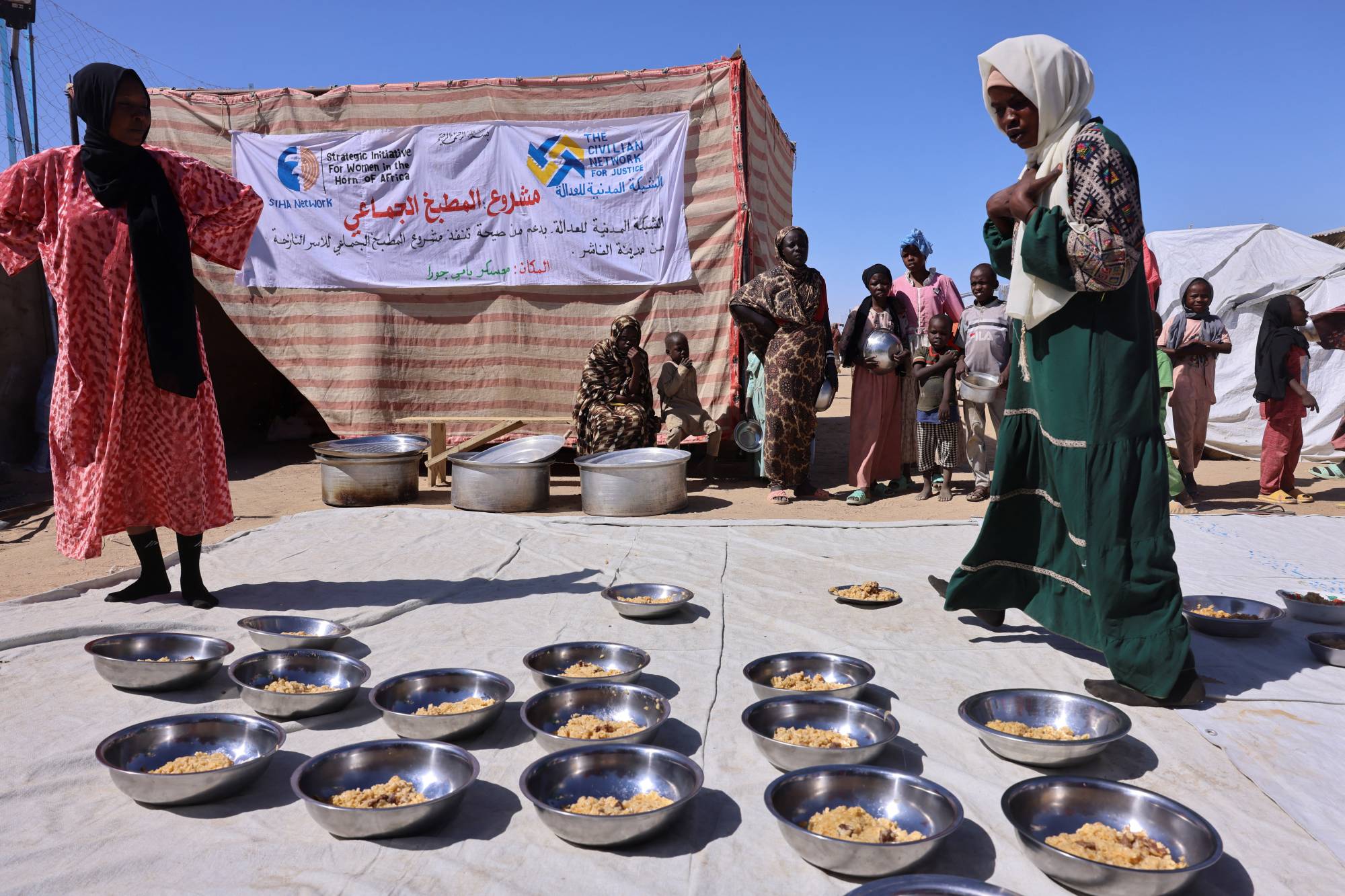 After 1,000 days of war, Sudanese survive between hunger and flight