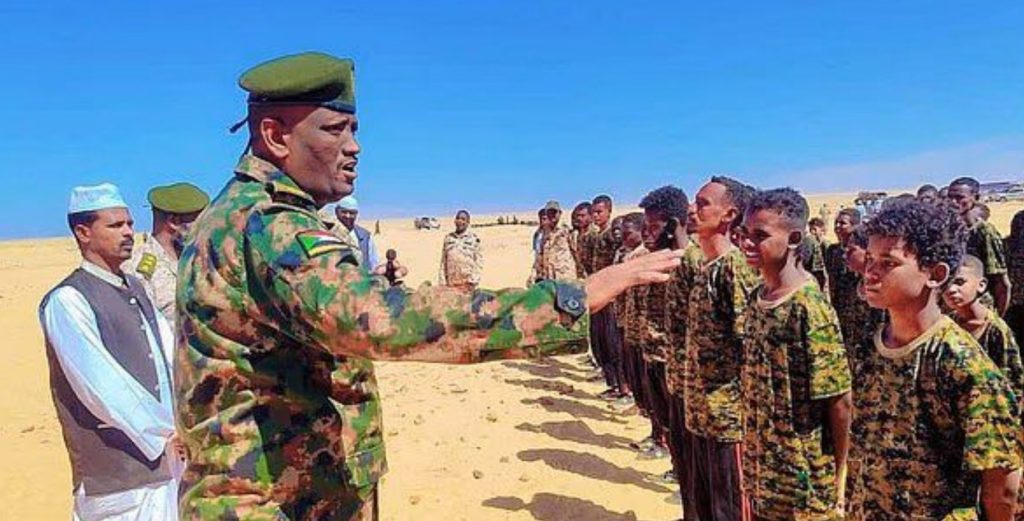 Children in military uniforms chant for SAF, British report says