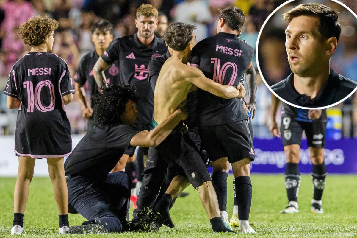 Fans knock Lionel Messi down during pitch invasion in Puerto Rico