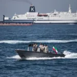Iran warns of retaliation as Hormuz crisis deepens