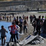Ceuta overwhelmed as thousands of migrants cross from Morocco