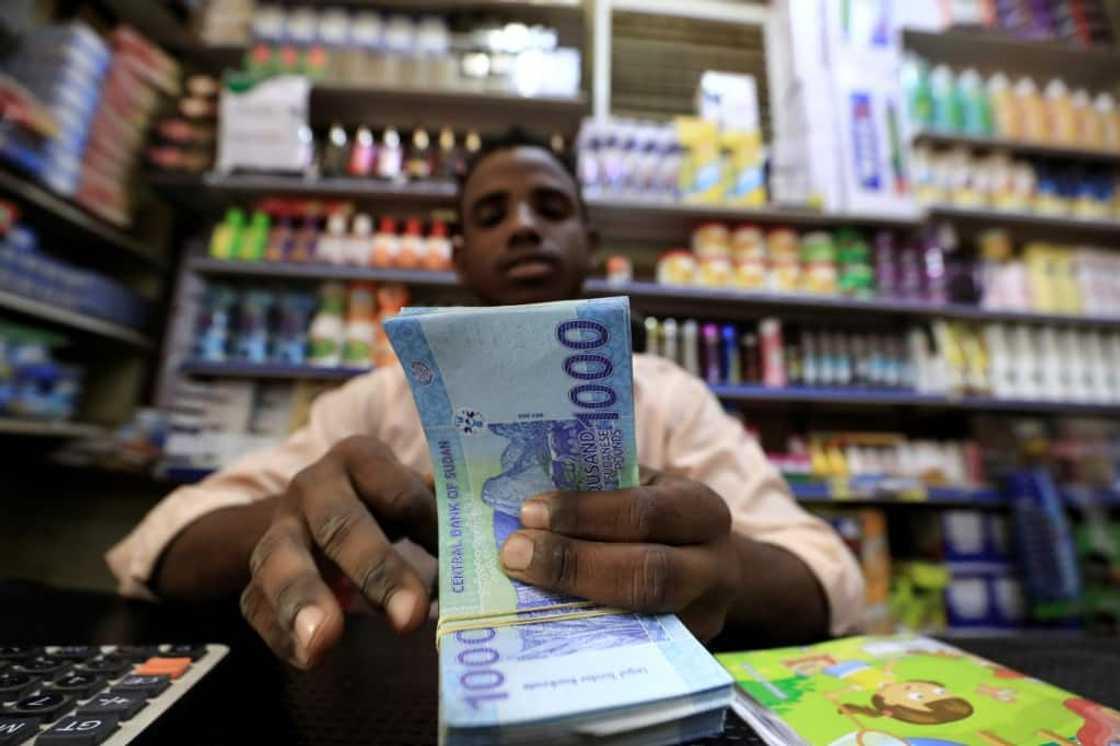 Sudanese pound hits record low as cash shortage deepens