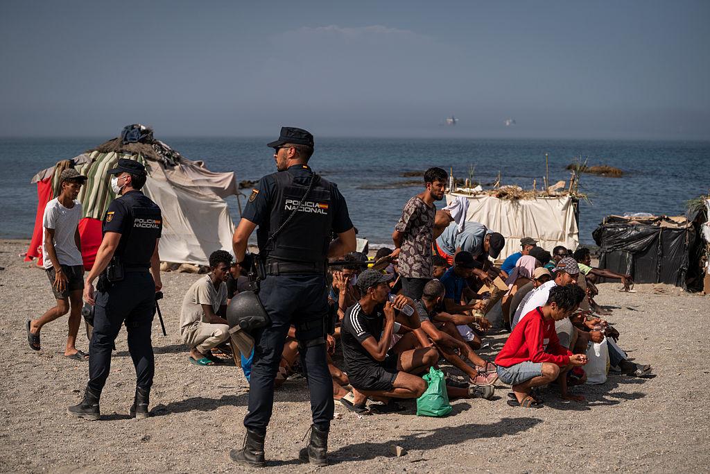 Spanish police clear migrants from Ceuta beaches
