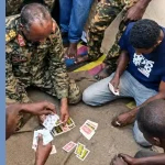 Sudan army chief seen playing cards on Khartoum street