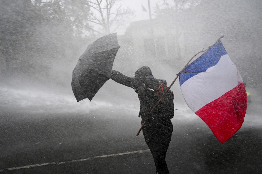 Nearly 1,000 arrested as protests erupt across France
